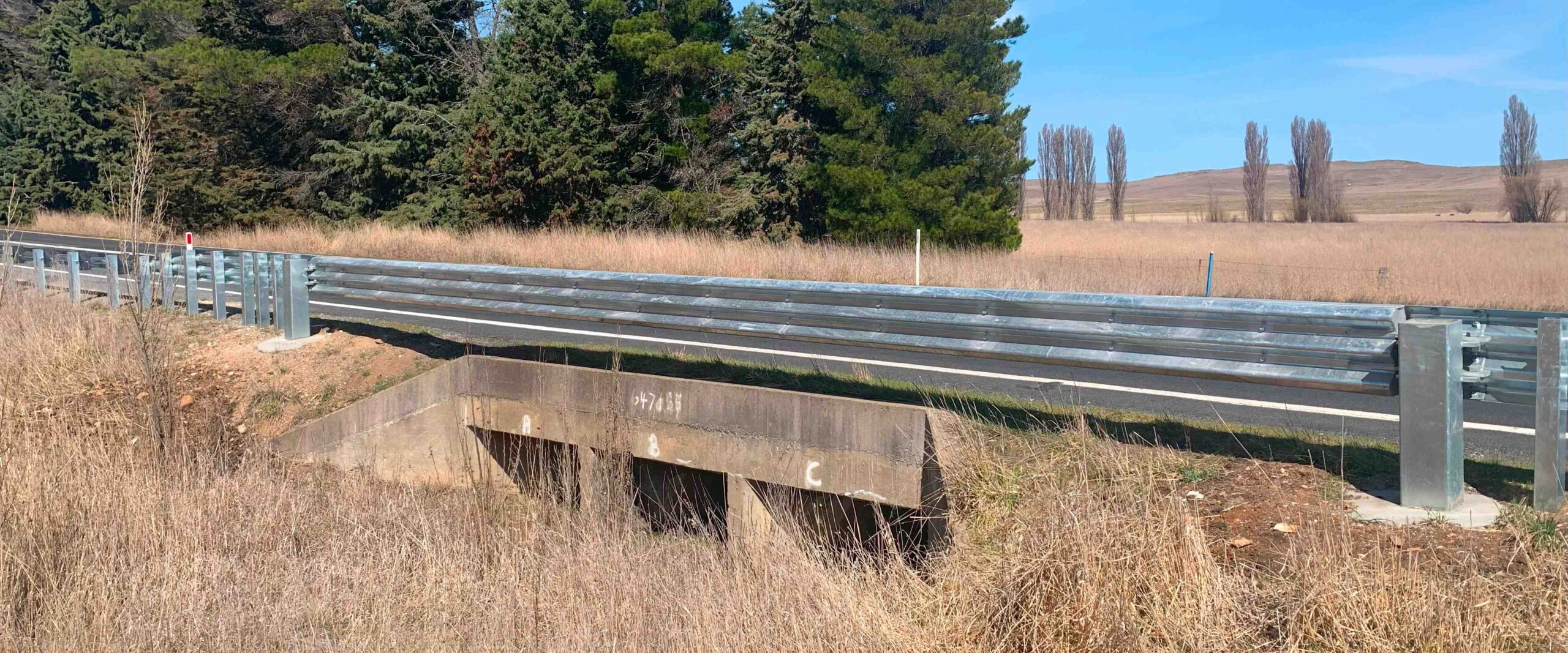 Bridge & Culvert Crash Barriers are specifically designed to provide safe vehicle containment when installed along the edge of an elevated structure. Our range of bridge & culvert barrier systems include thrie-beam guardrail supporting by yielding side mounted posts and a freespan crash barrier system with no attachment to the bridge or culvert structure.